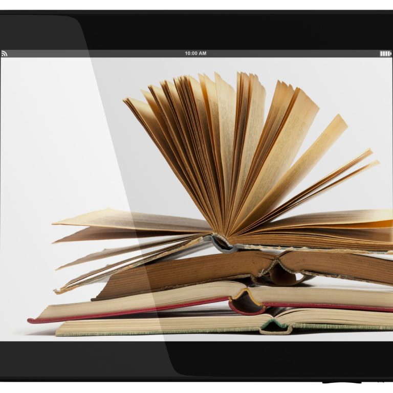 An open book atop closed books, with a tablet displaying e-reading.